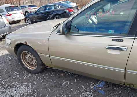 2000 Mercury Grand Marquis Ls z USA, uszkodzony, nr VIN 2MEFM75W1YX669068